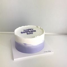 a birthday cake with the words happy birthday day written on it in white frosting