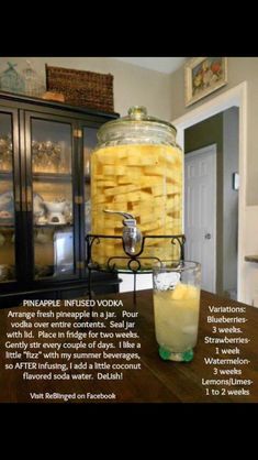 a glass jar filled with food sitting on top of a wooden table