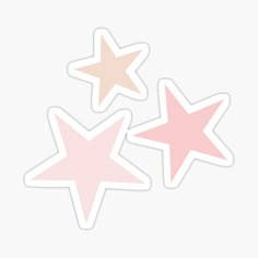 three pastel stars stickers on a white background, one is pink and the other is beige