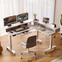 a computer desk with two monitors and a keyboard