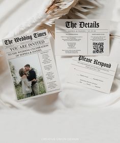 an image of wedding announcement cards with the details printed on them and two doves next to it