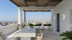 an outdoor dining area overlooking the city and ocean is featured in this rendering by architectural prosthetics