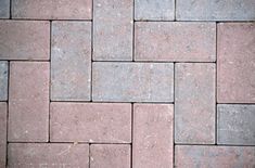 a close up view of a brick walkway