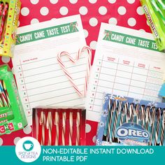 candy canes, candy sticks and candy candies on a table with candy test cards