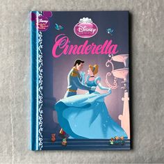 an image of a book with the title cinderella written in english and spanish on it