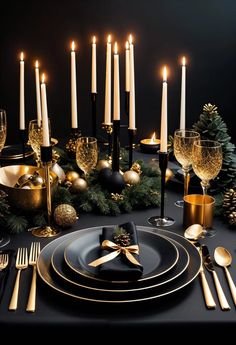 black and gold christmas table setting with silverware, napkins, candles and decorations