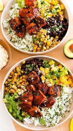 two bowls filled with rice, chicken and black beans next to avocado slices