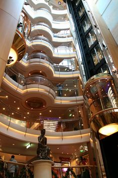 the inside of a large building with many balconies