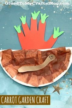 a paper plate with an image of a carrot on it and the words carrot garden craft