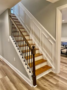 staircase with custom trimwork Stairway Molding Trim Work, Staircase Molding Ideas, Paneling On Staircase, Wall Trim On Stairs, Wainscoting For Stairs, Box Trim Staircase, Stairway Trim Wainscoting, Waynes Coating Staircase