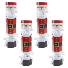 six paper nutcrackers with santa's outfit on them