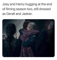 two people hugging each other with the caption that reads, jory and henry hugging at the end of filming season two, still dressed as geralt