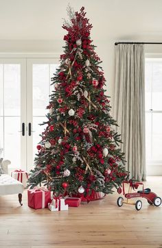 a decorated christmas tree in a living room