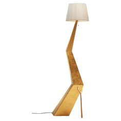 the floor lamp is made out of wood