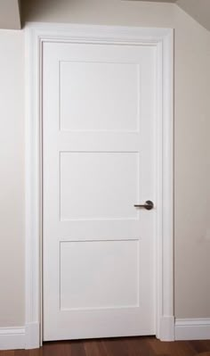 an open door with the word door style on it in front of a white wall