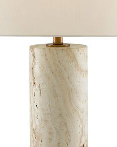 a marble lamp with a white shade on it's base and a gold metal frame