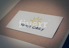 a sticker with the word yama daily written in black ink on a piece of paper