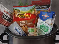 a large pot filled with lots of different types of food and snacks on top of it