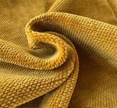 a close up shot of a yellow towel