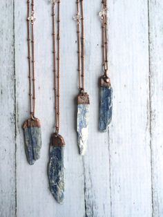 Kyanite necklace | Raw kyanite jewelry | Kyanite healing crystal necklace | Blue kyanite necklace | Kyanite mineral necklace | Kyanite stoneThis listing is for one kyanite crystal electroformed and strung on a 30" copper satellite chain.This necklace does not have a clasp. It is designed to slip on over the head. Our jewelry is unique and one-of-a-kind. Please note there will likely be variances in the size, shape and color of each stone. All elements of your piece are handcrafted in our tiny st Mineral Necklace, Kyanite Necklace, Kyanite Jewelry, Horn Pendant Necklace, Estilo Hippie, Horn Pendant, Moon Pendant Necklace, Bohol, Crystal Necklace Pendant