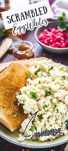 scrambled eggs and toast on a plate with raspberries in the background text overlay reads scrambled eggs and toast