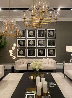 a living room filled with furniture and a chandelier