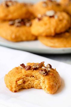 some cookies are sitting on a white plate