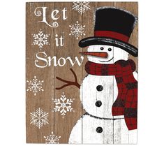 a wooden sign that says let it snow with a snowman wearing a top hat and scarf