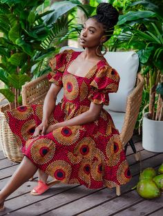 Boasting a stylish square neckline and a tiered skirt, the Batik Dress offers comfort and a flattering silhouette with a fun, twirl-ready design. * sash belt not included Approx. 38" Length (center back) based on size M 100% Cotton. Colours: Multi-print (green, navy, ivory, black) Cotton lined bodice Back zipper closure African Print Smocked Dress, African Graduation Dress Style, African Summer Dress, Cute African Dresses, African Style Dresses, Dresses African Fashion, Chitenge Dresses, Wax Dress, Wax Print Dress