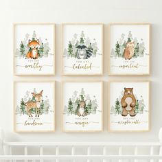 four framed pictures with animals and words on them