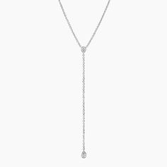 Pear Lab Diamond Bezel Lariat Necklace - 14K White Gold. A chic classic, this lariat necklace features two bezel-set pear lab diamonds gracefully resting on a chain that can be adjusted to 18, 19, or 20 inches to suit individual preference (3/8 total carat weight). Classic Lariat Necklace With Delicate Chain, Classic Long Drop Lariat Necklace With Adjustable Chain, Classic Lariat Drop Necklace For Anniversary, Classic White Gold Lariat Necklace, Formal Lariat Necklace With Teardrop Pendant, Classic Drop Necklace With Adjustable Chain, Classic Long Drop Lariat Necklace For Formal Occasions, Classic Long Drop Lariat Necklace For Formal Events, Classic Diamond Lariat Necklace