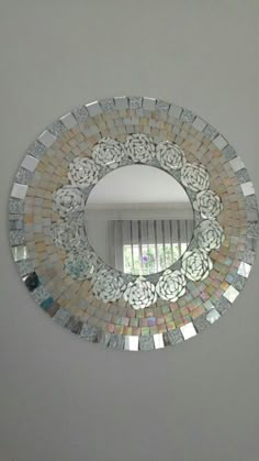 a mirror that is hanging on the wall