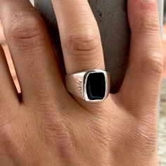 Black Onyx Signet Ring , Onyx Wedding Ring For Men , Square Onyx Ring , Minimalist Signet Ring , 925k Sterling Silver Ring ,Gift For Men ★Item Details * Gender : Male / Female * Material : 925K Sterling Silver * Total weight : 9 Grams * Gemstone : Onyx Stone ✔ Ready to Ship in 1-2 Business Days .. ✔ Shipped to the Worldwide 1-5 business days with free shipping... ✔ The product will be sent to you with a handmade wooden box to avoid any damage during shipping... ✔ Visit our store, browse other Men's jewelry, silver and gold collections, and find the perfect piece you're looking for... Click For Our Other Products https://www.etsy.com/shop/MercansilverTR?ref=simple-shop-header-name&listing_id=1003010735 White Gold Onyx Rings For Gift, Minimalist Onyx Rings For Formal Occasions, Minimalist Onyx Ring For Formal Occasions, Black Minimalist Engraved Sterling Silver Ring, Minimalist Silver Onyx Signet Ring, Signet Ring With Stone, Onyx Wedding Ring, Wedding Ring For Men, Ring With Stone