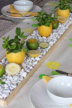 the table is decorated with lemons and limes