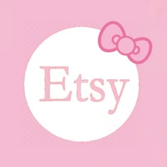 the word etsy written in pink and white with a hello kitty bow on it