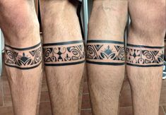 three men's legs with tattoos on them