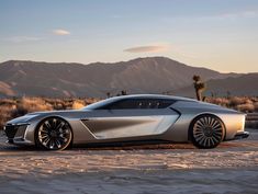 a futuristic car is parked in the desert