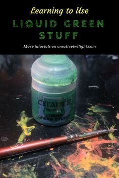 an image of liquid green stuff next to a paintbrush on a table with text overlay reading learning to use liquid green stuff