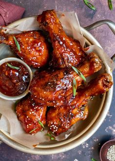 chicken wings with dipping sauce on a plate