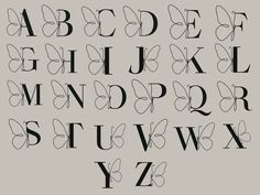 the alphabet is made up of letters and numbers with black ink on white paper, as well as some type of lettering