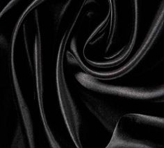 black silk fabric with very smooth folds