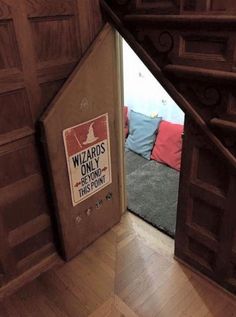 an open door to a bedroom with a sign on it