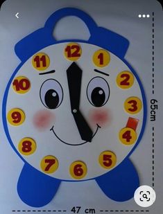 a blue and white clock with numbers on it