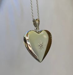 "Diamond Heart Locket in Sterling Silver, * 3/4 Inch Pendant * Holds 2 Photos * Solid 925 Sterling Silver, NOT Plated * Chain in 6 Lengths, 16\", 18\", 20\", 22\", 24\", 30\" * Gift for Women: Mother, Grandmother, Daughter, Sister, Wife, Friend * Rhodium Anti-Tarnish Coating * Comes in Gift Box with Velvet Pouch Thank you for visiting HarperSilver! 🎁Packaging: This item comes gently packaged in a fabric pouch housed inside of a silver foil linen box with a silver bow. It is ready to present as Ugly Heart, Picture Locket, Sterling Silver Locket, Fabric Pouch, Photo Locket Necklace, Silver Locket, Heart Locket Necklace, Jewelry Lockets, Sister Wife