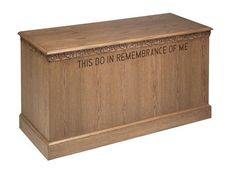 a wooden box with the words this do in remembrance of me on it