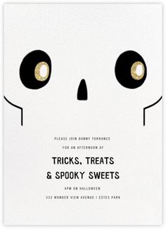 a white card with black eyes and gold foil on the bottom reads tricks, treats & spooky sweets