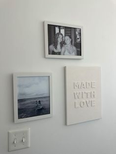 three framed photos hang on the wall next to each other