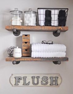 two shelves with towels and other items on them