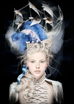 In this particular photo, called La Belle Poule, Alexia shows a modern day version of an extravagant headpiece Marie Antoinette wore of a model of a French ship of that name. Lily Cole, Avant Garde Hair, Beltane, Hair Art, Marie Antoinette, Versailles, Rococo, Headdress, Blue Hair