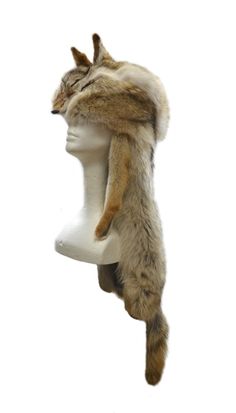 Coyote full fur hat with quilt lined crown Shell: 100% Natural Coyote Lining: 100% Polyester Quilted Lining Made in Canada Washing Instructions: Fur Clean Only Crown Cap, Ivy Cap, Luxury Hats, Aviator Hat, Trapper Hat, Mountain Man, Fur Hat, Lynx, Earmuffs